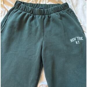 Brandi Melville Green New York low rise sweatpants